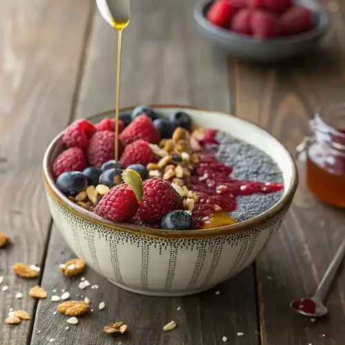 Chia Berry Pudding topped with honey and nuts.
